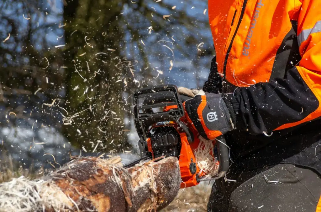 tree service near me man cutting a tree Best Tree Surgeons tree service near me man cutting a tree